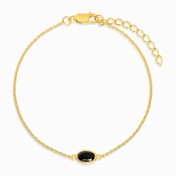 Armband med svart kristall Onyx i guld. Kristallarmband med Onyx juli månadssten.